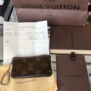 Louis Vuitton Authentic Key Pouch Monogram (small tear)